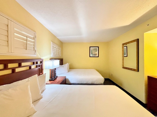 bedroom featuring a textured ceiling