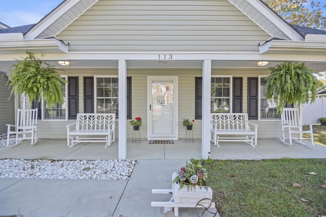 doorway to property with a porch