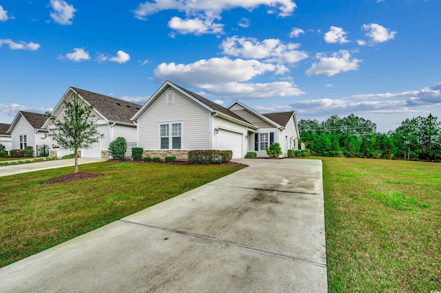 view of front of house featuring a front lawn and a garage