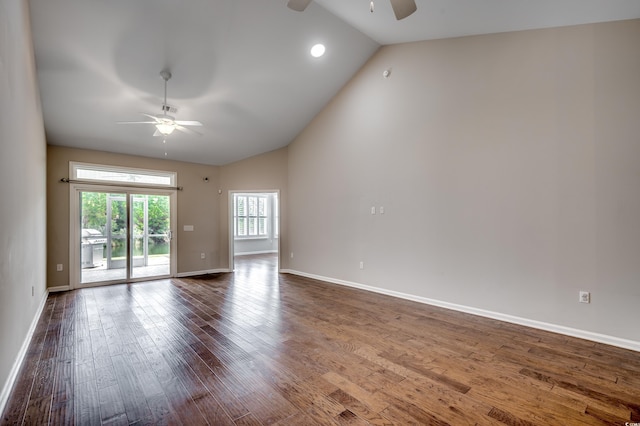 unfurnished room with hardwood / wood-style floors, ceiling fan, and vaulted ceiling