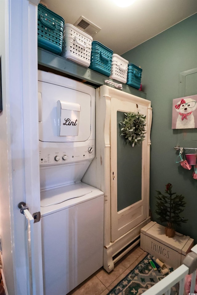 2256 Heritage Loop Unit 2256, Myrtle Beach, SC 29577 - clothes washing area featuring tile patterned floors and stacked washer / drying machine