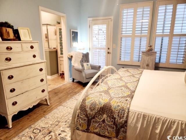 2256 Heritage Loop Unit 2256, Myrtle Beach, SC 29577 - bedroom with baseboards and light wood finished floors