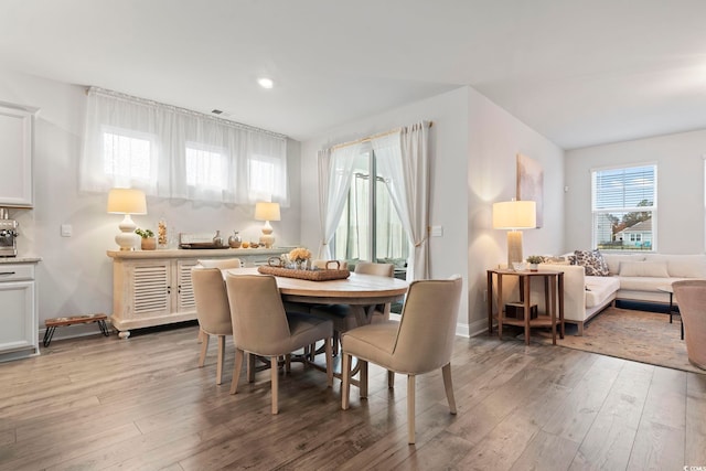 dining space featuring light hardwood / wood-style flooring