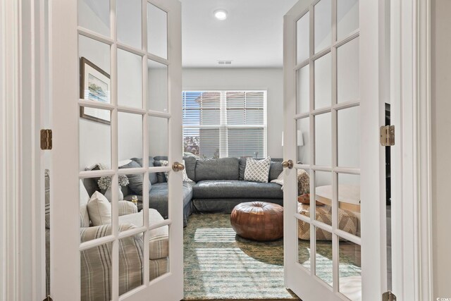 sitting room featuring visible vents