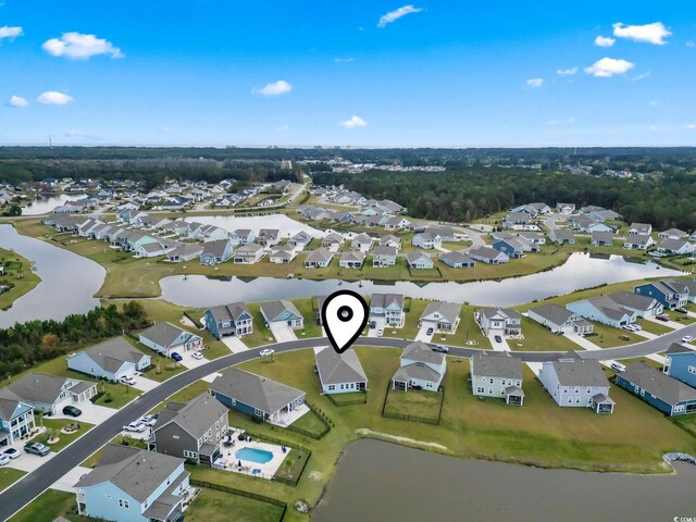 bird's eye view featuring a residential view and a water view