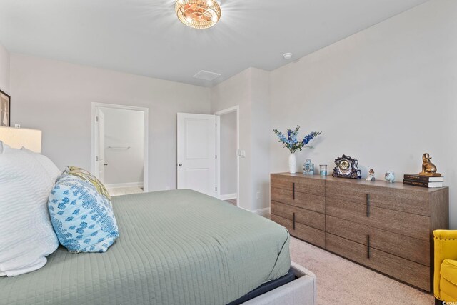 bedroom with visible vents, baseboards, and carpet floors