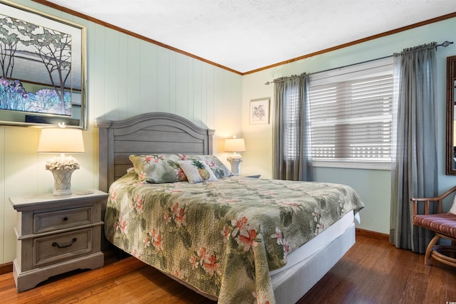 bedroom featuring wood walls, dark wood-type flooring, and ornamental molding