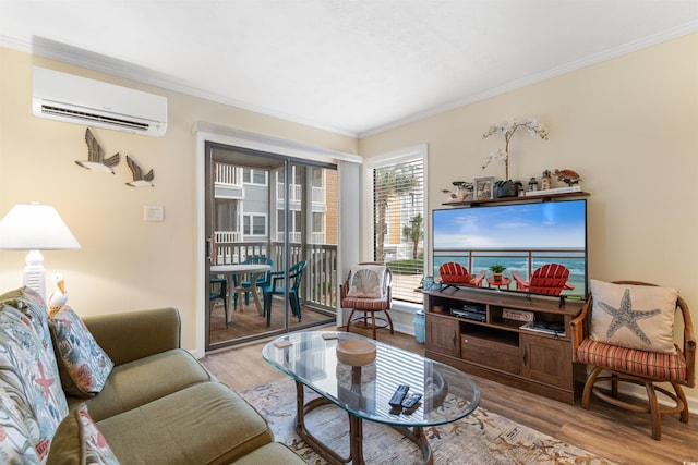 living room featuring crown molding, light hardwood / wood-style flooring, and a wall mounted air conditioner