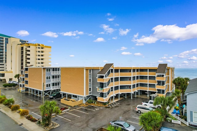 view of building exterior featuring a water view