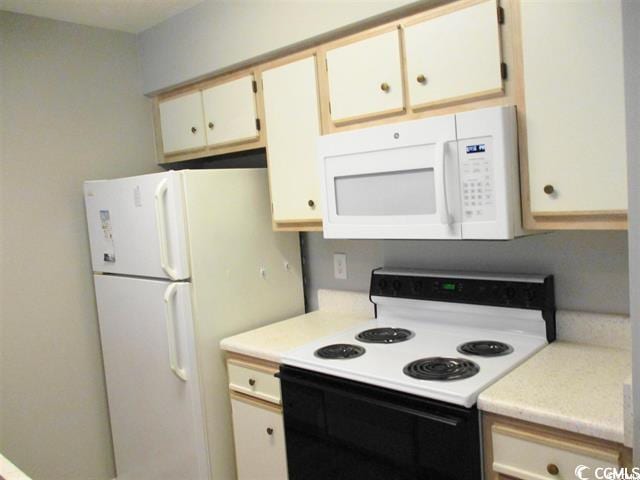 kitchen featuring white appliances