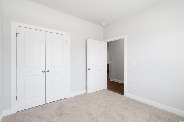 spare room with hardwood / wood-style flooring and french doors