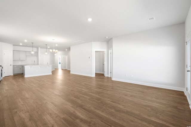 spare room featuring light hardwood / wood-style floors