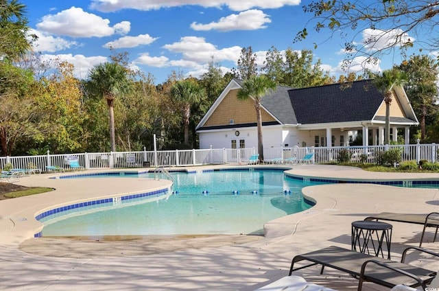 view of pool featuring a patio