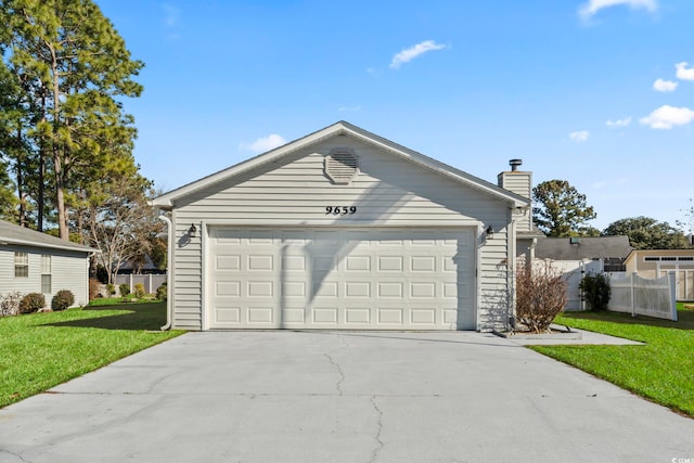 garage with a lawn