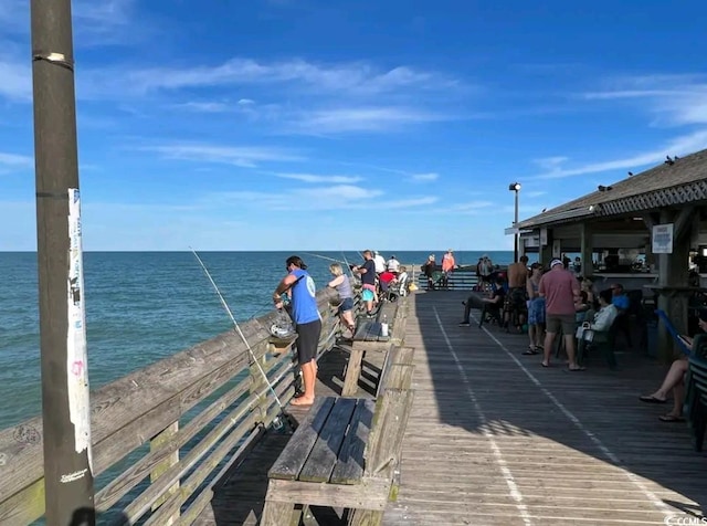 view of dock with a water view