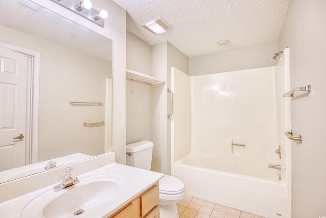 full bathroom featuring tile patterned floors, tub / shower combination, a textured ceiling, vanity, and toilet