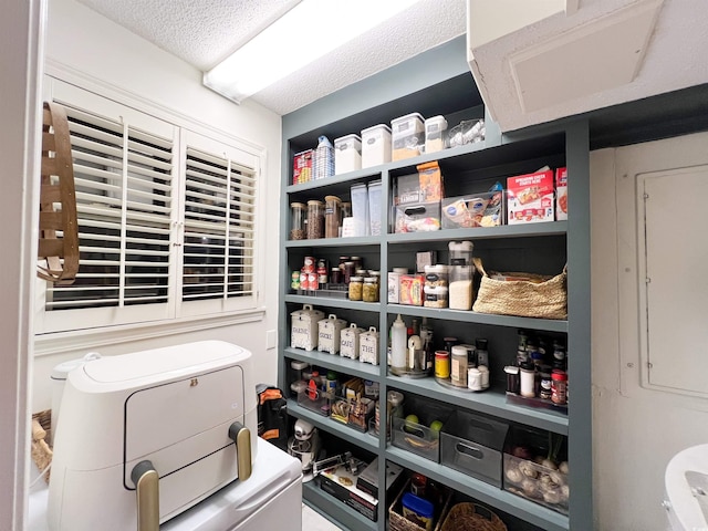 pantry featuring washer / dryer