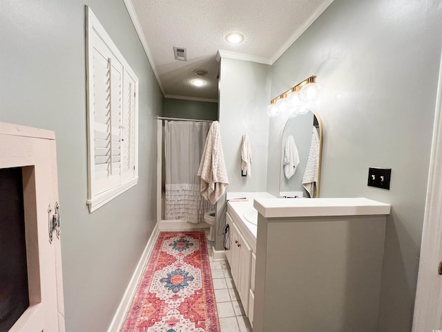 bathroom featuring crown molding, vanity, a textured ceiling, tile patterned floors, and toilet