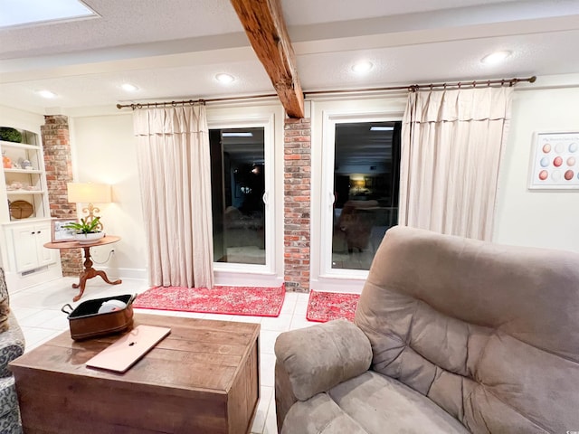 tiled living room featuring built in features and beamed ceiling