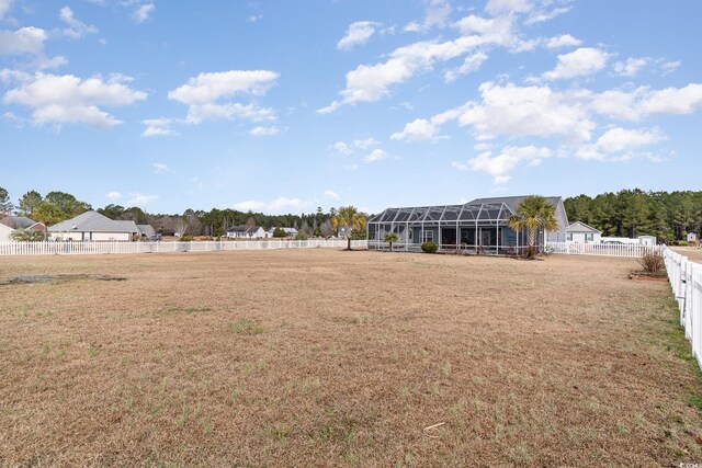 view of yard featuring a lanai