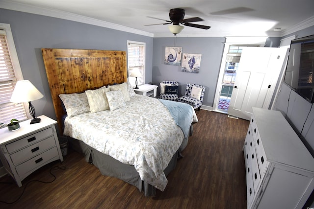 bedroom featuring dark hardwood / wood-style floors, ceiling fan, and crown molding