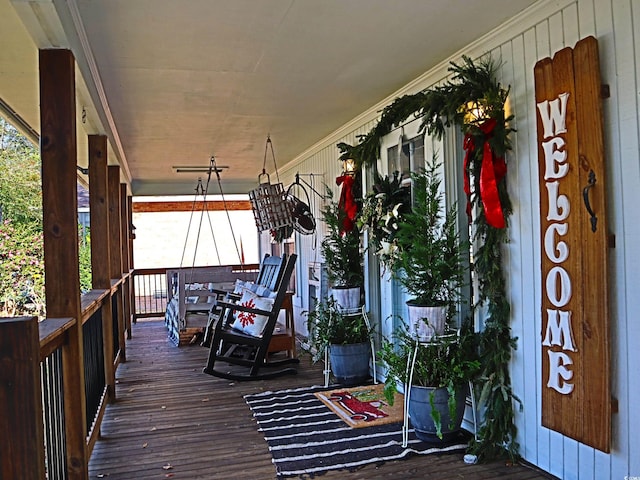 deck featuring covered porch