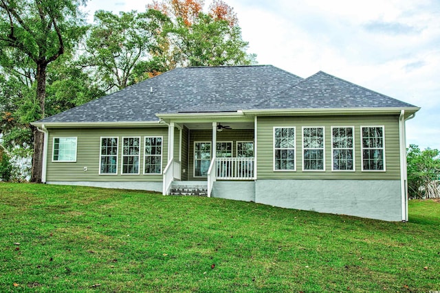 back of property featuring a porch, a yard, and ceiling fan