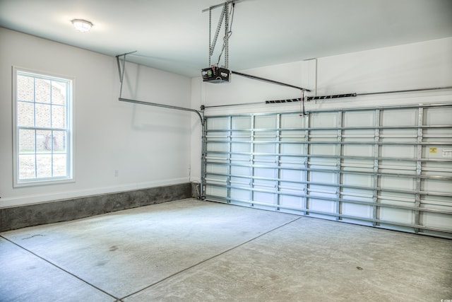 garage featuring a garage door opener