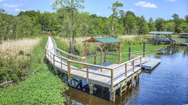 view of dock with a water view