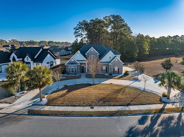 view of front facade with a front yard