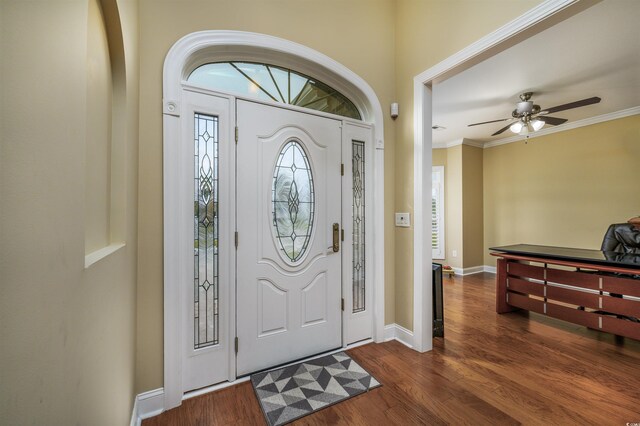 entrance to property featuring a lawn