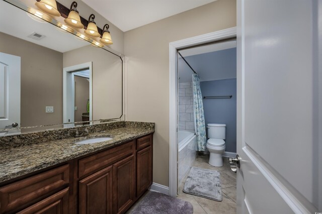 bathroom with vanity and vaulted ceiling