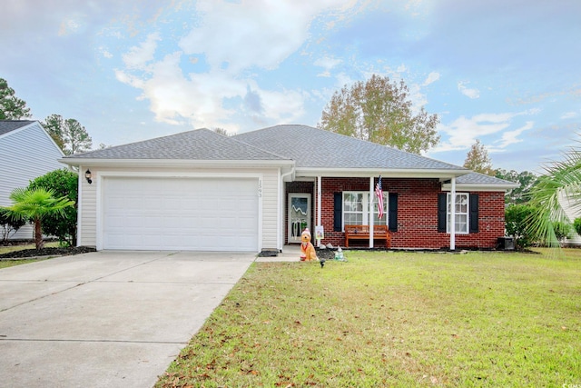 ranch-style home featuring a front yard and a garage