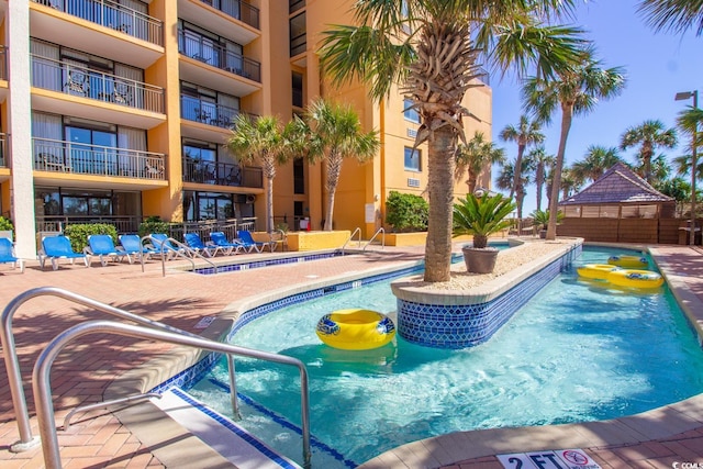 view of pool with a patio area