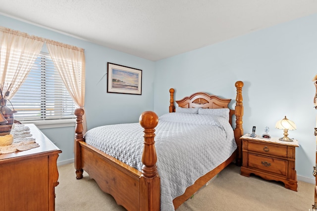 100 Ocean Creek Dr Unit L5, Myrtle Beach, SC 29572 - bedroom with light carpet and baseboards