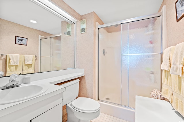 100 Ocean Creek Dr Unit L5, Myrtle Beach, SC 29572 - full bath with toilet, tile patterned flooring, a shower with shower door, and vanity