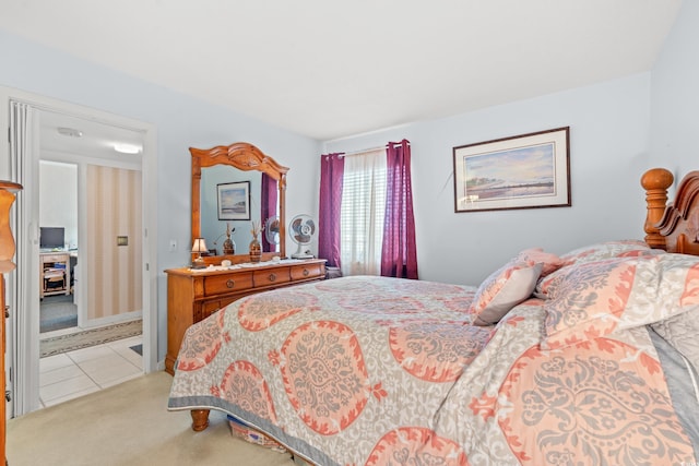 bedroom with light carpet