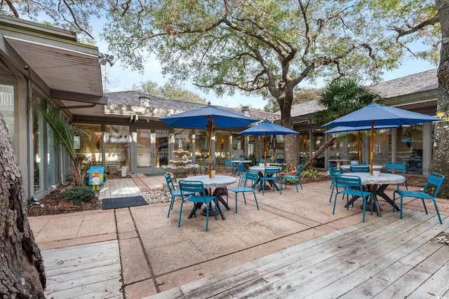 100 Ocean Creek Dr Unit L5, Myrtle Beach, SC 29572 - deck featuring outdoor dining area