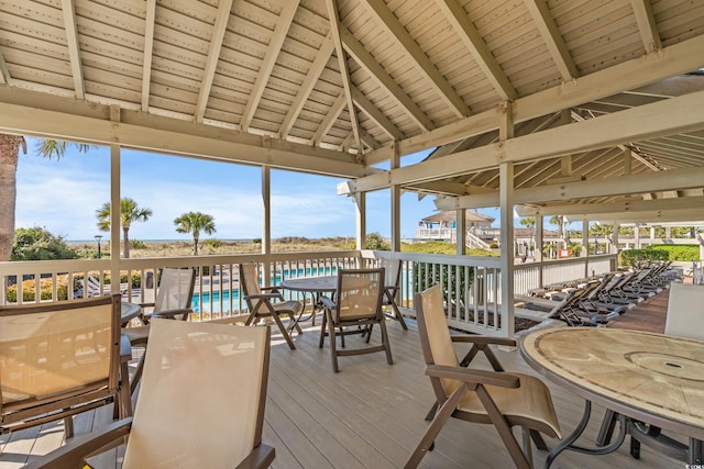 100 Ocean Creek Dr Unit L5, Myrtle Beach, SC 29572 - wooden deck with outdoor dining space