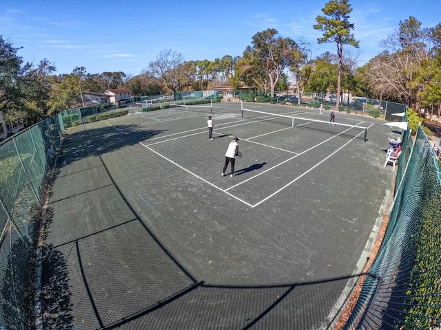 view of sport court with basketball hoop