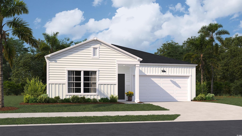 view of front facade with a garage and a front yard