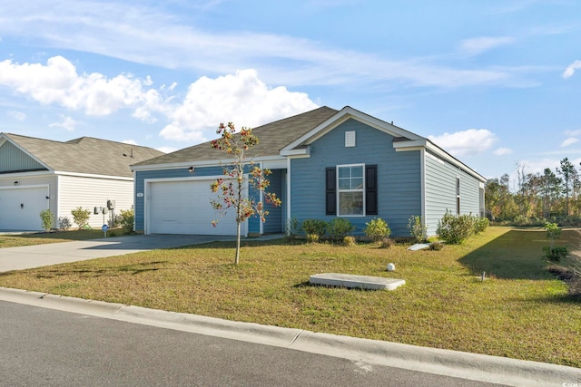 ranch-style home with a front yard and a garage