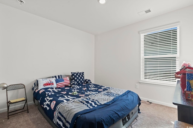 bedroom featuring carpet flooring