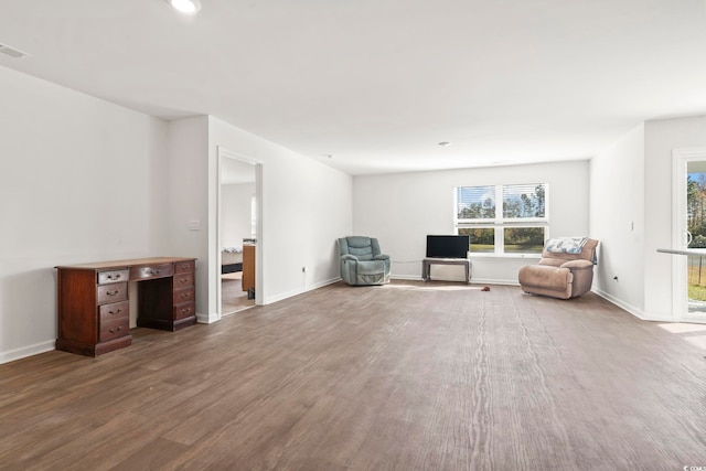 unfurnished room with hardwood / wood-style flooring