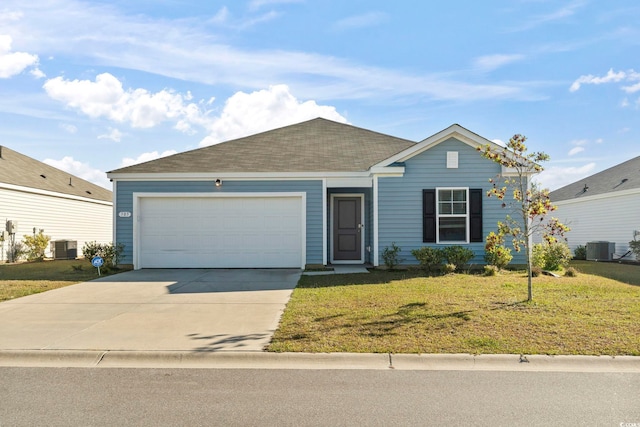 ranch-style home with central air condition unit, a front lawn, and a garage