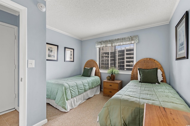 carpeted bedroom with crown molding and a textured ceiling