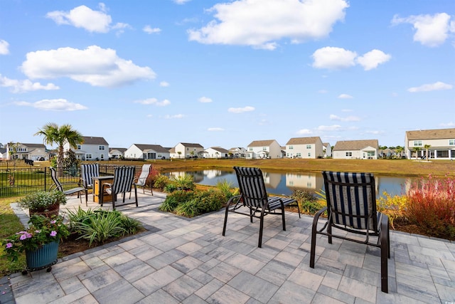 view of patio / terrace with a water view