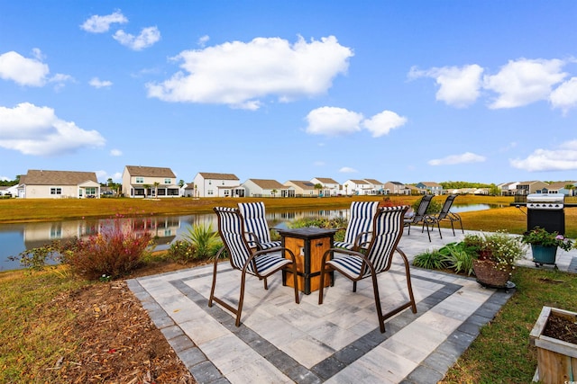 view of patio featuring a water view