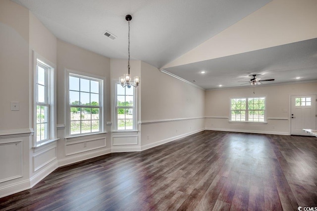 unfurnished dining area featuring ceiling fan with notable chandelier, visible vents, ornamental molding, dark wood-style floors, and recessed lighting