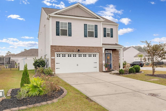 568 Affinity Dr, Myrtle Beach, SC 29588 - view of front of home featuring brick siding, an attached garage, driveway, and board and batten siding